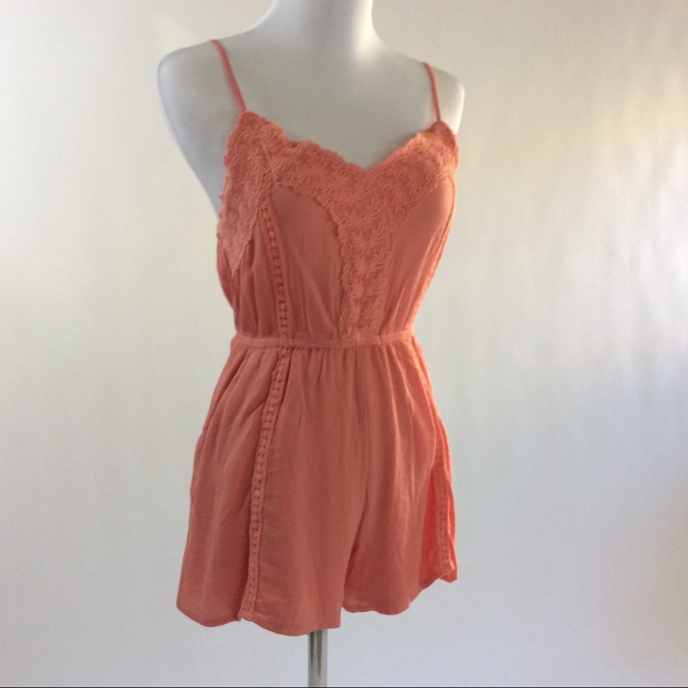 A beautiful romper two different sizes L/M